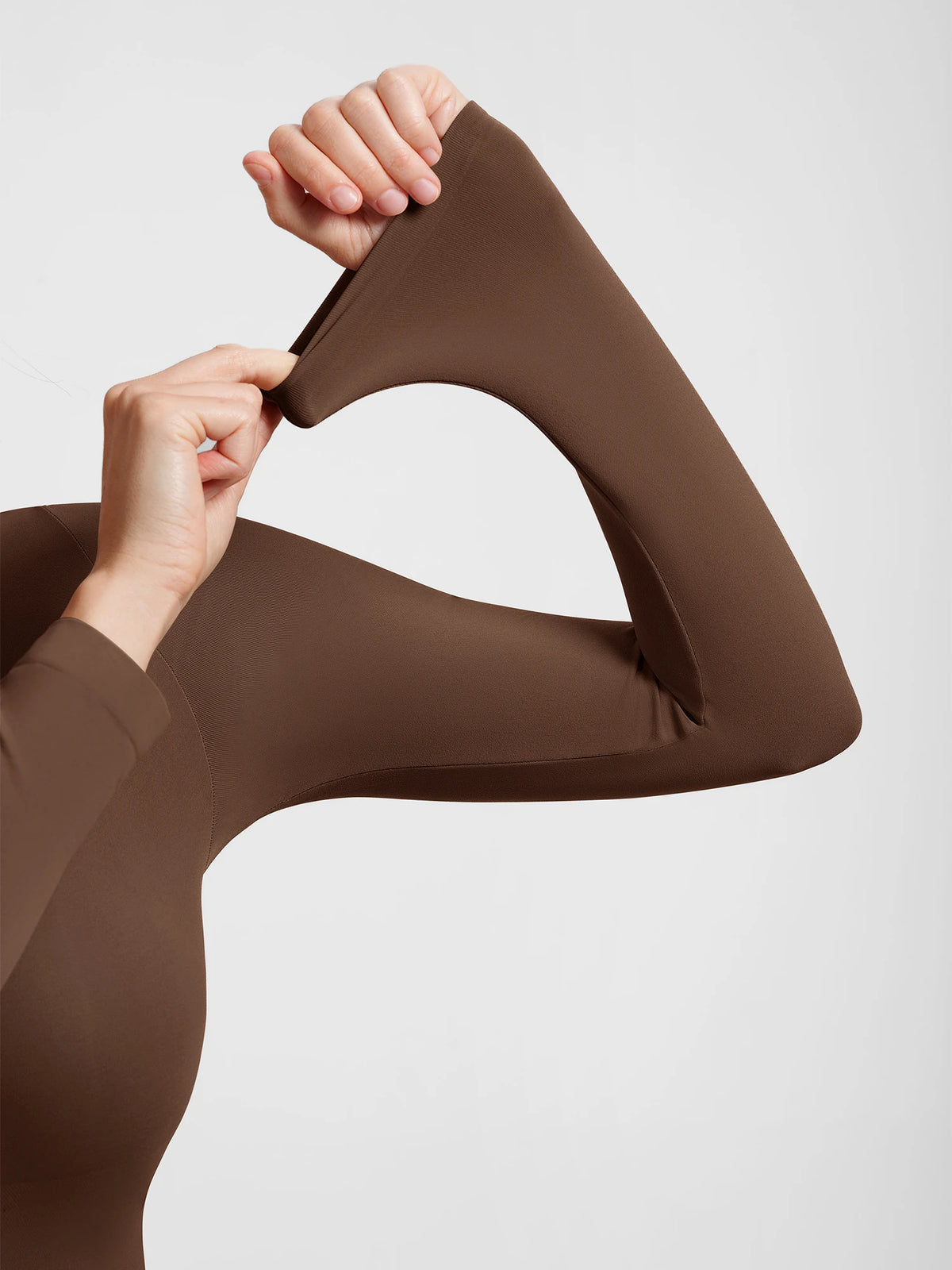 Shop a high neck seamless bodysuit with buttery-soft fabric, light tummy control, and a second-skin fit. Versatile for layering, work, and everyday wear.