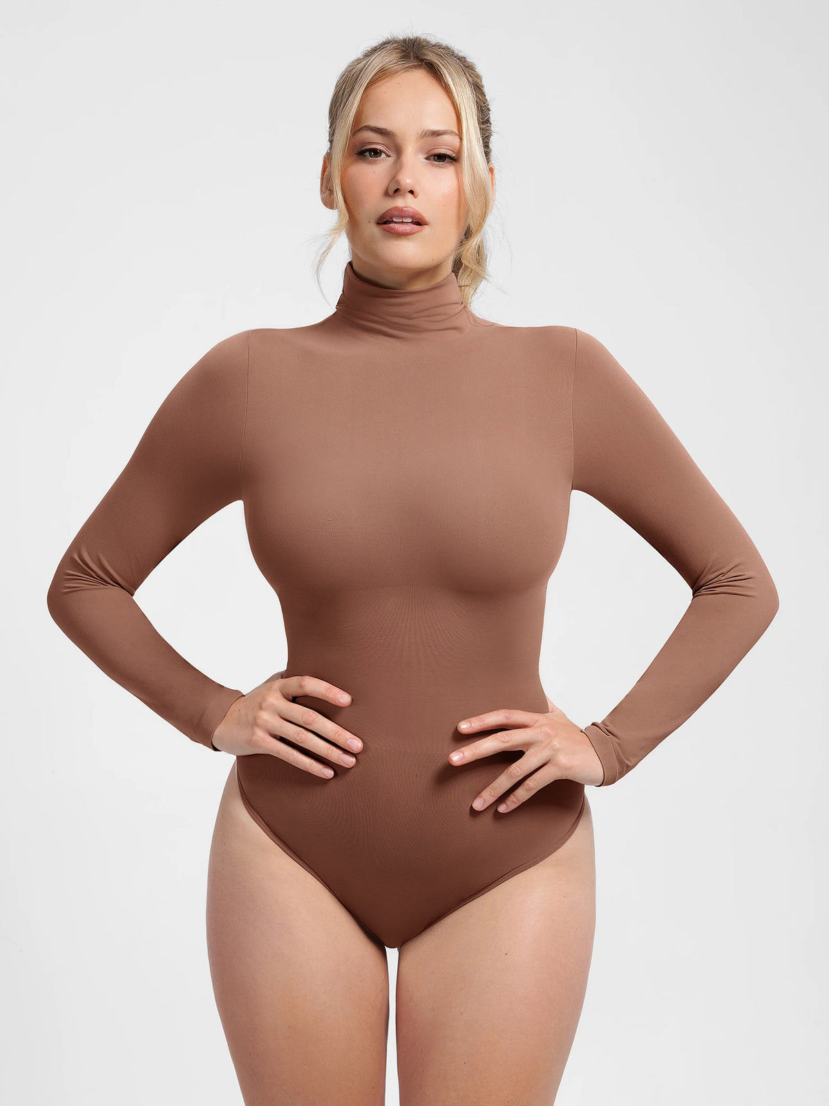 Shop a high neck seamless bodysuit with buttery-soft fabric, light tummy control, and a second-skin fit. Versatile for layering, work, and everyday wear.