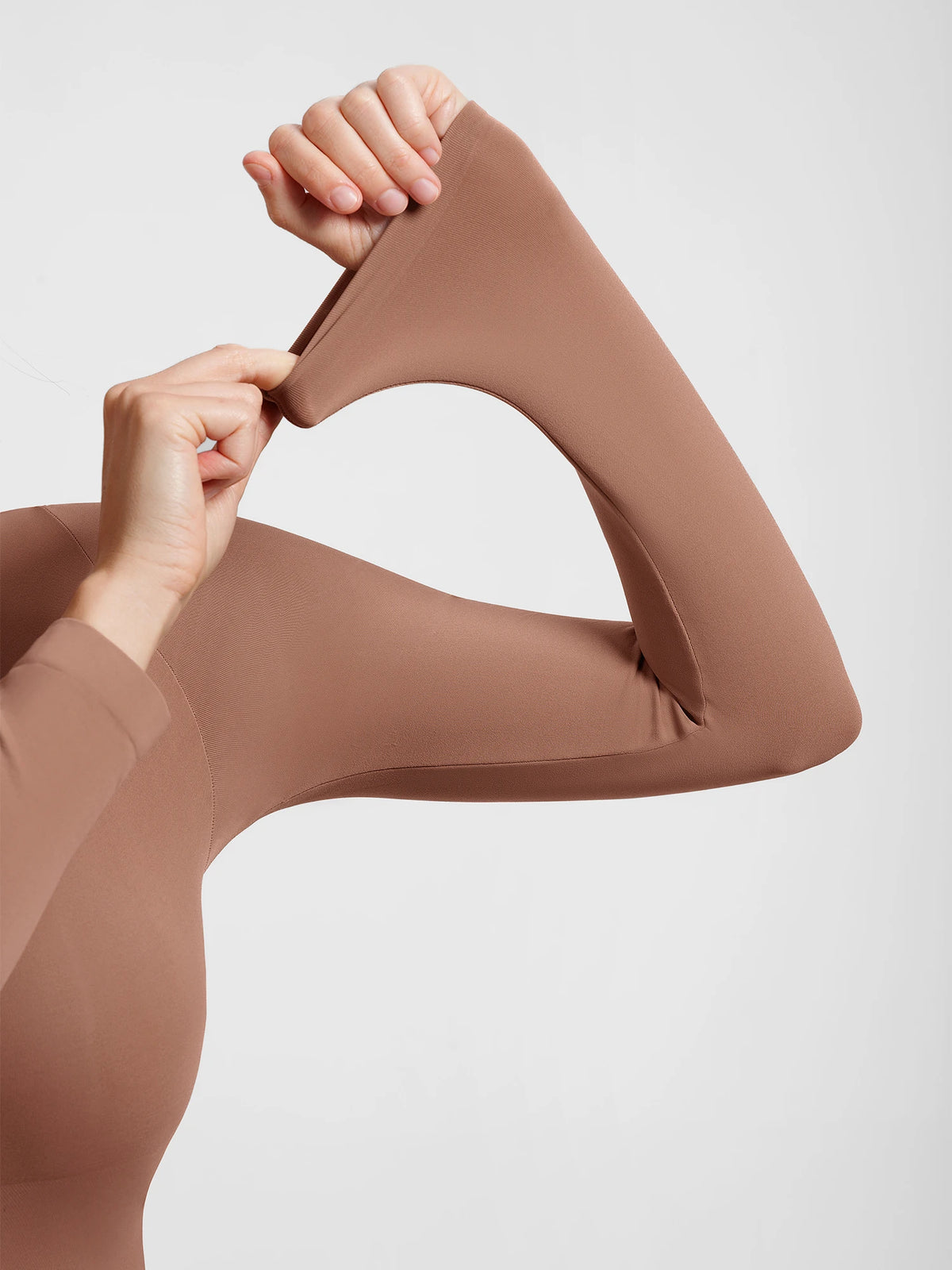Shop a high neck seamless bodysuit with buttery-soft fabric, light tummy control, and a second-skin fit. Versatile for layering, work, and everyday wear.